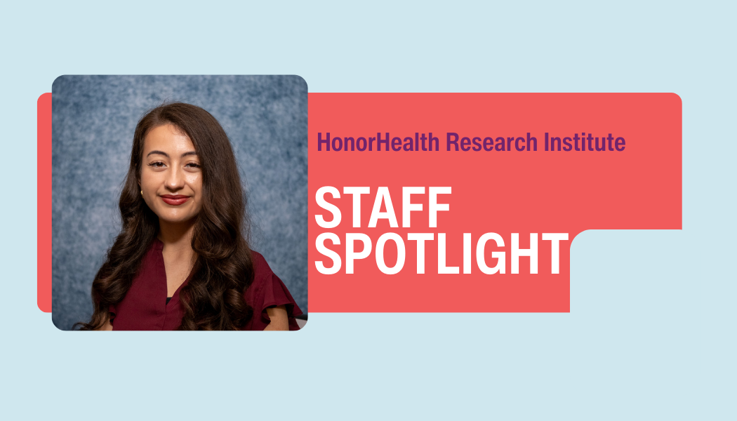 A woman with long dark hair smiles in front of a blue background; text reads "HonorHealth Research Institute Staff Spotlight.